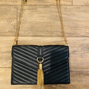 Small black and gold I.N.C. Purse
